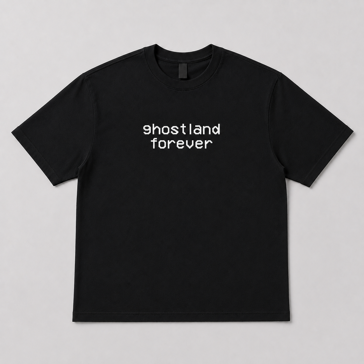 A black short-sleeve crewneck t-shirt with the words 'ghostland forever' printed in white lowercase letters across the chest, displayed flat against a light gray background.
