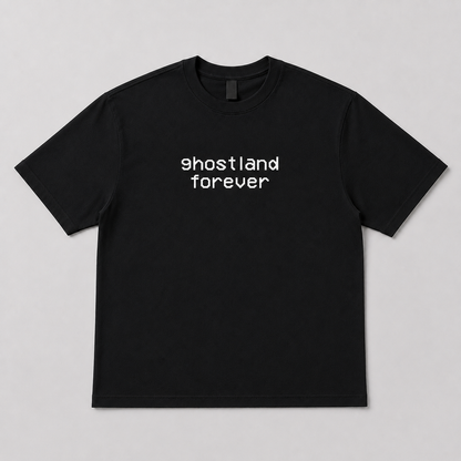 A black short-sleeve crewneck t-shirt with the words 'ghostland forever' printed in white lowercase letters across the chest, displayed flat against a light gray background.