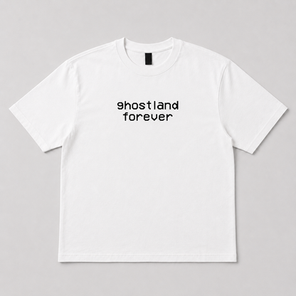 A white short-sleeve crewneck t-shirt with the text 'ghostland forever' printed in black lowercase letters across the chest, displayed flat against a neutral gray background.