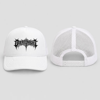 A white trucker hat shown from the front and back on a light gray background. The front features a black spiky metal-style logo that reads 'Overtonight'.