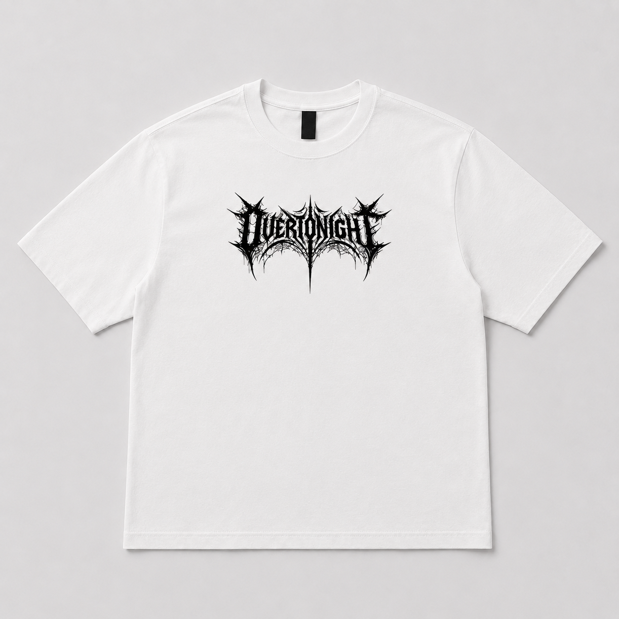A white short-sleeve crewneck t-shirt featuring a black spiky metal-style graphic logo on the chest that reads 'OVERTONIGHT'. The shirt is displayed flat against a neutral light gray background.